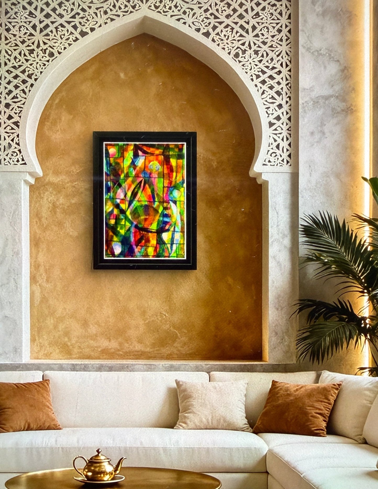 Colorful abstract painting on a wall above a white sofa with decorative pillows.