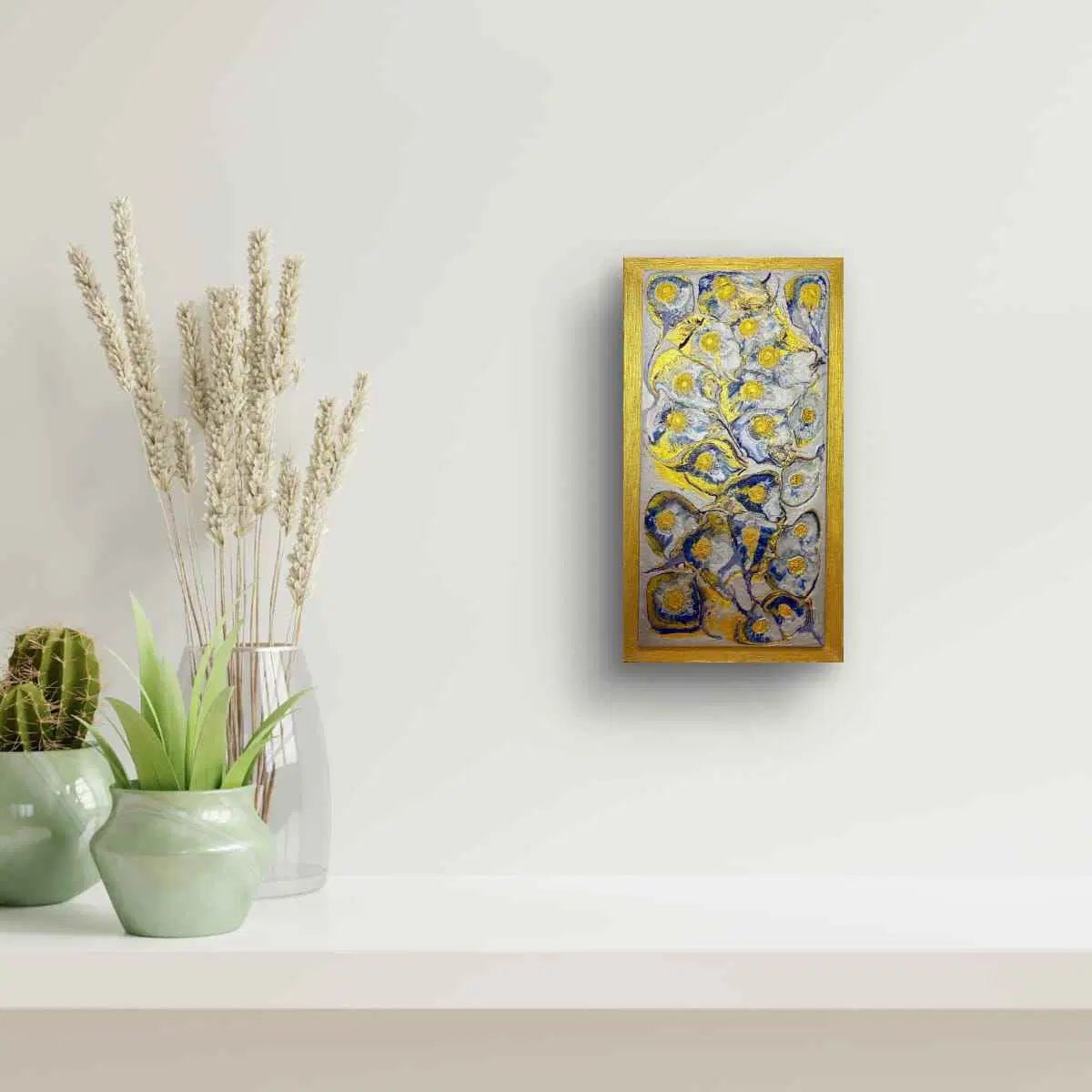 Decorative painting on a wall with plants in the foreground