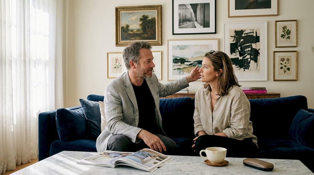 Couple reviewing art in luxury living room