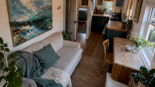 Tiny home with connected zones and original art