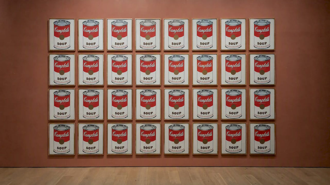 Warhol’s repeated soup-can paintings in a gallery