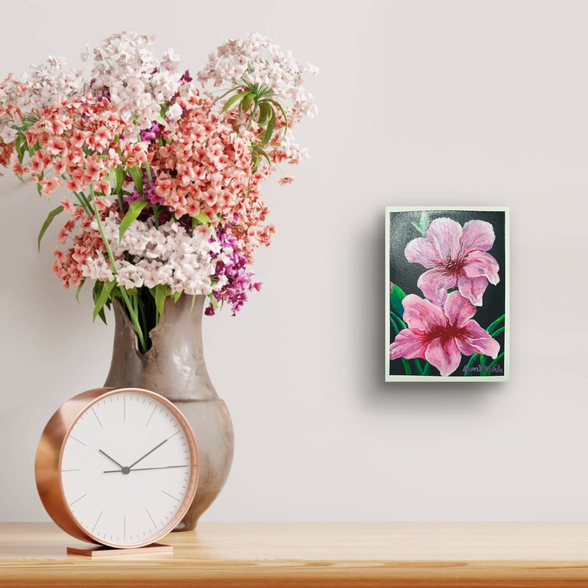 Bouquet of flowers in a vase with a clock and floral painting on a wall of an original acrylic painting of two pink blossoms on dark background, botanical floral art by Eman Khalifa.