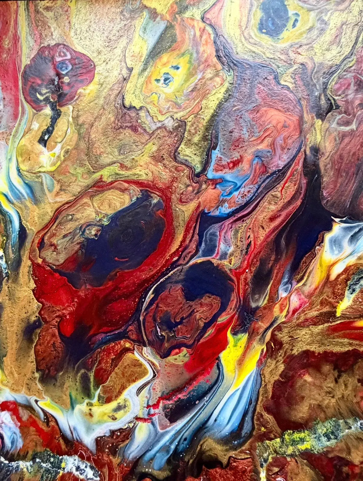 Abstract artwork with swirling fire colors on a textured surface